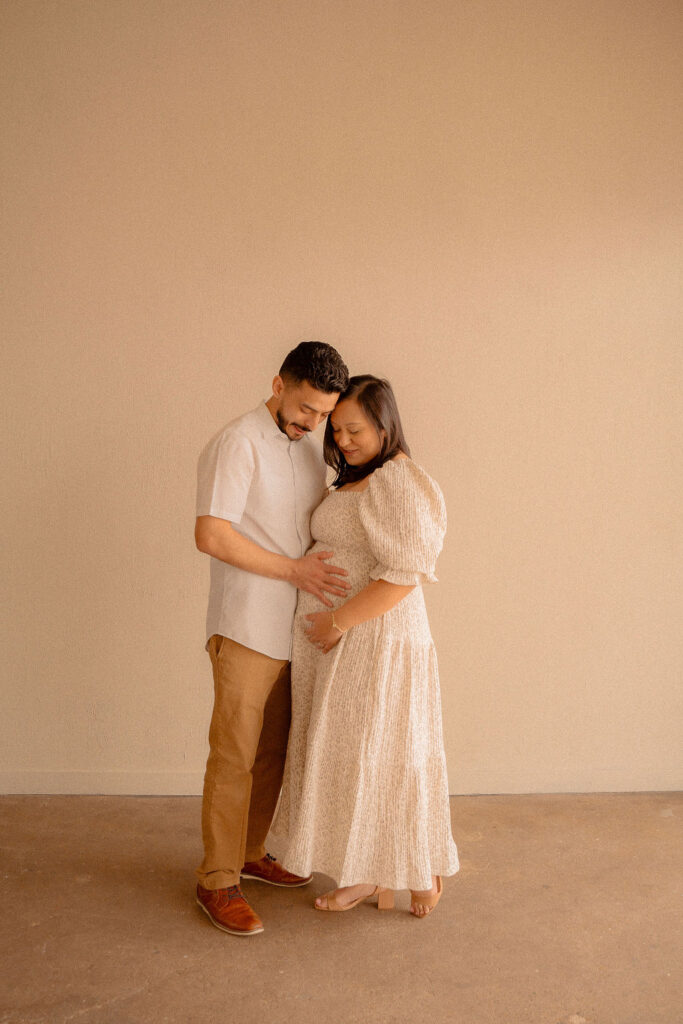 Married couple at their maternity photoshoot