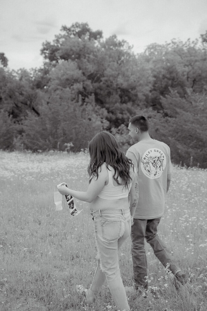 Black and white photos of couple holding their babies sonogram 